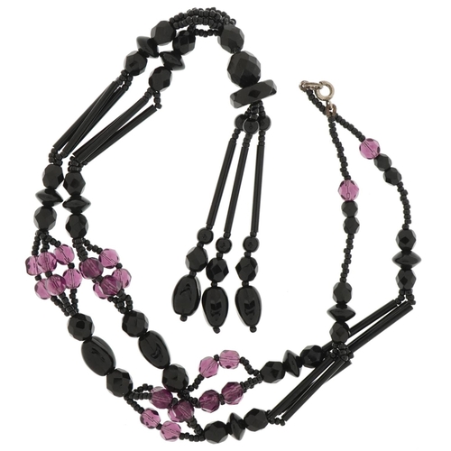 3690 - Vintage black and amethyst glass necklace with tassel pendant, 58cm in length, 19.0g