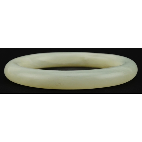 3582 - Chinese white jade bangle, 7.5cm in diameter, 41.5g