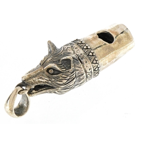 3657 - Novelty sterling silver whistle pendant in the form of a wolf's head, 4.7cm high, 12.4g