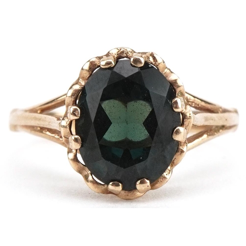 3512 - 9ct gold green topaz solitaire ring with split shoulders, the topaz approximately 10.0mm x 8.0mm x 4... 