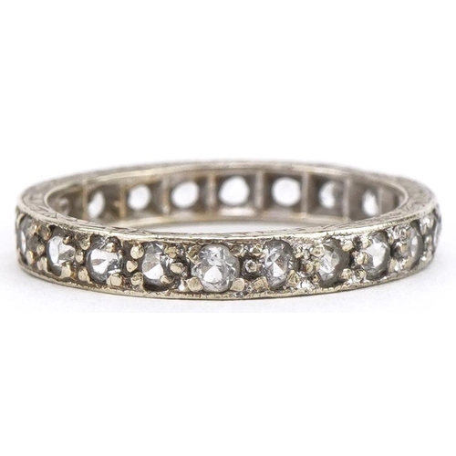 3395 - White gold clear stone eternity ring, indistinct hallmarks, size J/K, 2.0g