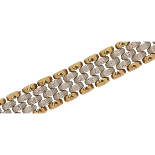 3161 - 9ct two tone gold watch strap design bracelet, 18cm in length, 12.2g