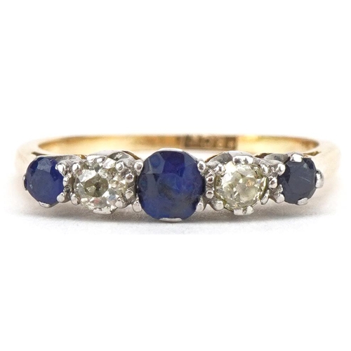 3047 - 18ct gold graduated sapphire and diamond five stone ring, the central sapphire approximately 4.0mm i... 