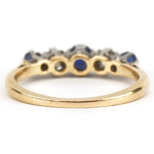 3047 - 18ct gold graduated sapphire and diamond five stone ring, the central sapphire approximately 4.0mm i... 