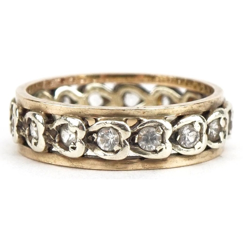 3050 - 9ct gold clear stone love heart eternity ring, size I, 2.9g