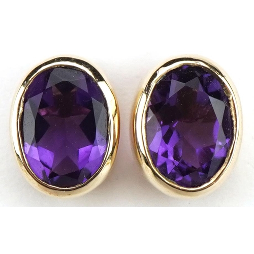 3688 - Pair of 9ct gold amethyst solitaire stud earrings, 9.2mm high, 2.4g