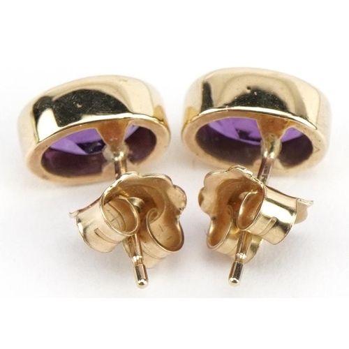 3688 - Pair of 9ct gold amethyst solitaire stud earrings, 9.2mm high, 2.4g