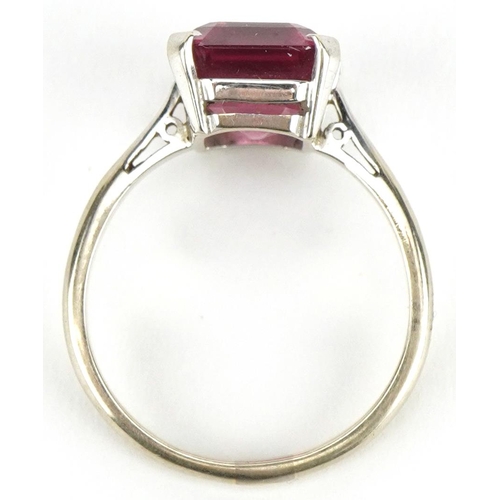 3441 - 9ct white gold rectangular cut ruby ring, the ruby approximately 11.20mm x 8.80mm x 6.20mm deep, siz... 