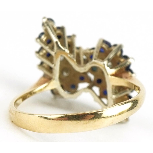 3042 - Unmarked gold diamond and sapphire cocktail ring, tests as 9ct gold, size L/M, 3.0g