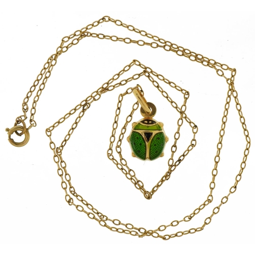 3684 - 9ct gold green enamelled ladybird pendant on a 9ct gold necklace, 1.9cm high and 50cm in length, 2.2... 