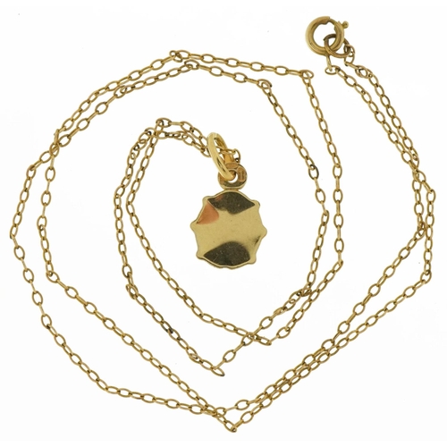 3684 - 9ct gold green enamelled ladybird pendant on a 9ct gold necklace, 1.9cm high and 50cm in length, 2.2... 