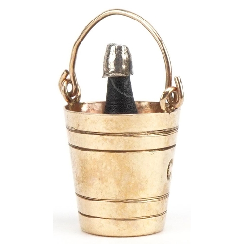 3638 - 9ct gold Champagne bottle and ice bucket charm, 2.1cm high, 1.5g