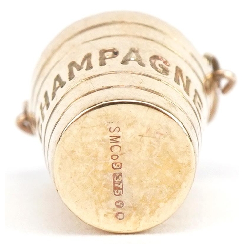 3638 - 9ct gold Champagne bottle and ice bucket charm, 2.1cm high, 1.5g