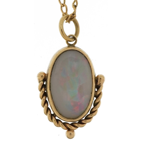 3331 - 9ct gold opal pendant on a 9ct gold necklace, 2.3cm high and 44cm in length, 4.7g