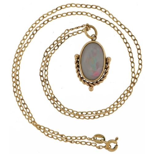 3331 - 9ct gold opal pendant on a 9ct gold necklace, 2.3cm high and 44cm in length, 4.7g