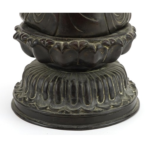 69 - Large Chinese patinated bronze figure of Shakyamuni Buddha on lotus stand, 37cm high