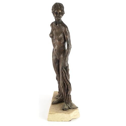 571 - Manner of Neil Godfrey, Mid century style bronzed sculpture of a nude standing female on naturalisti... 