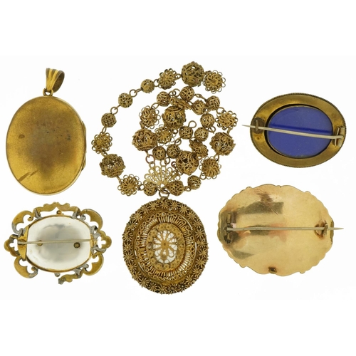 3056 - Antique jewellery comprising unmarked gold enamel mourning brooch, two yellow metal and enamel mourn... 