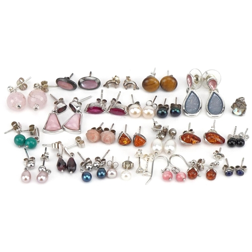 3667 - Selection of mostly silver earrings, some set with semi precious stones, including tiger's eye, ambe... 