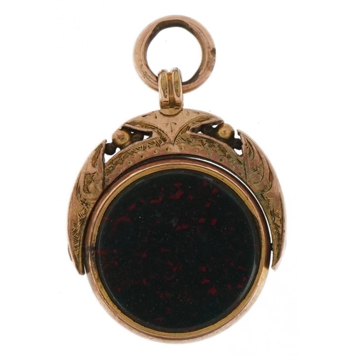 3176 - Victorian unmarked rose gold bloodstone and carnelian spinner fob, tests as 9ct gold, 2.2cm high, 6.... 