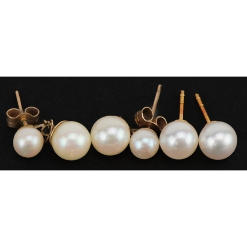 3650 - Three pairs of 9ct gold pearl earrings and two others, the largest 2cm high, total 5.3g