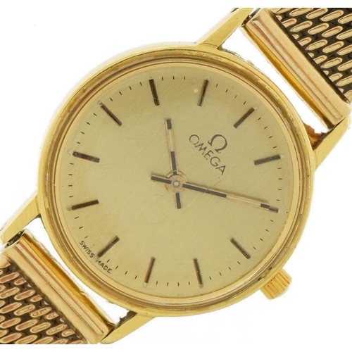 3048 - Omega, ladies 18ct gold wristwatch with 9ct gold strap with paperwork and Garrard & Co box, 21mm in ... 