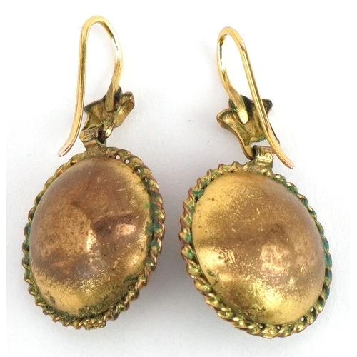 3070 - Pair of Victorian yellow metal cabochon garnet drop earrings, 3cm high, 6.8g