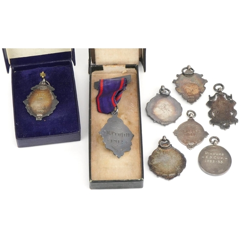 3417 - Seven silver sports jewels, six with enamel including Equitable Friendly Society, New Brompton Distr... 