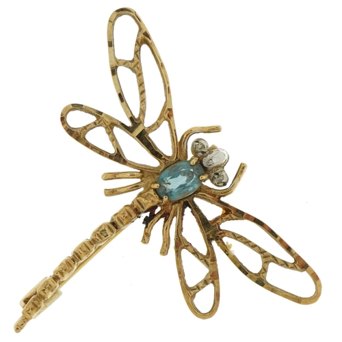 3591 - 9ct gold dragonfly brooch set with a blue topaz and white sapphires, 4.2cm wide, 4.0g