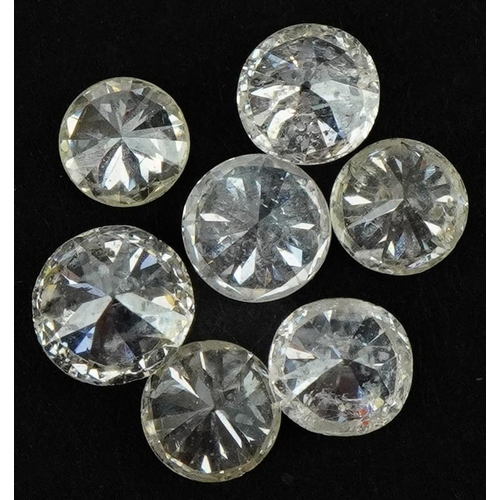 3601 - Seven loose diamond solitaires, the largest diamond approximately 0.17 carat