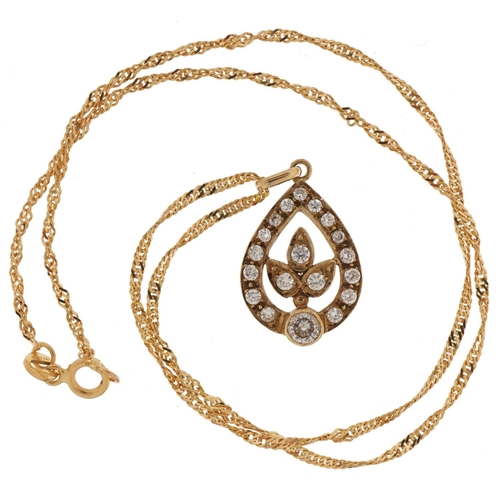 3455 - Unmarked gold clear stone teardrop pendant on a 9ct gold rope twist necklace, the pendant tests as 9... 