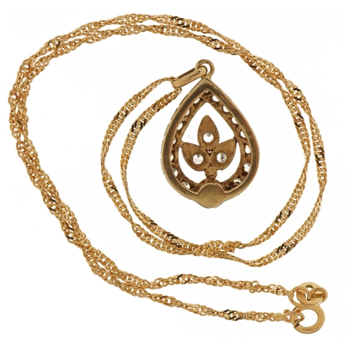 3455 - Unmarked gold clear stone teardrop pendant on a 9ct gold rope twist necklace, the pendant tests as 9... 