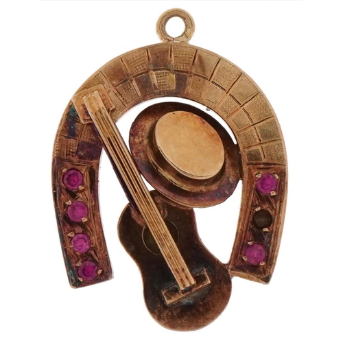 3460 - Unmarked gold pink topaz pendant in the form of a horseshoe, guitar and hat, tests as 9ct gold, 2.5c... 