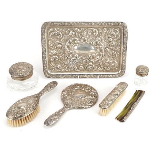 326 - Edwardian silver dressing table tray and six silver mounted dressing table items including hand mirr... 