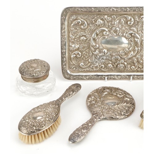 326 - Edwardian silver dressing table tray and six silver mounted dressing table items including hand mirr... 