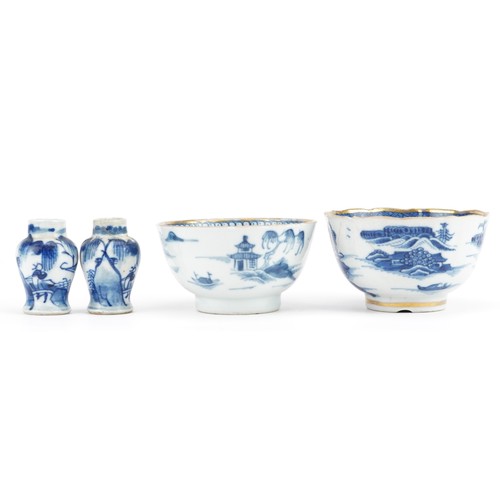 2575 - Chinese blue and white porcelain the comprising pair of baluster vases and two tea bowls, the larges... 