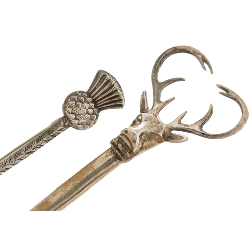 3712 - Two Scottish silver kilt pin brooches including one in the form of a stag's head, the largest 12cm i... 