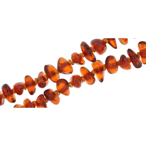 3550 - Natural amber coloured segment necklace, 44cm in length, 14.0g