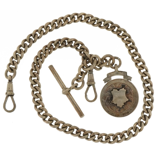 3545 - Heavy silver watch chain with T bar, dog clip clasps and sports jewel, 38cm in length, 64.5g