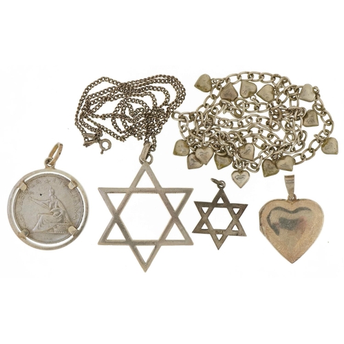 3522 - Silver and white metal jewellery including star of David pendants, love heart locket and a love hear... 