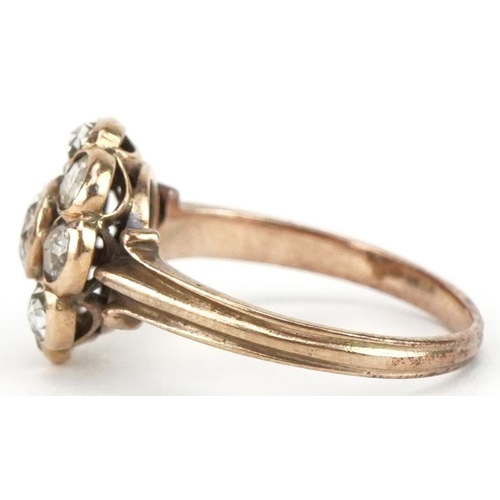 3025 - Antique unmarked gold diamond flower head ring, the central diamond approximately 4.20mm in diameter... 