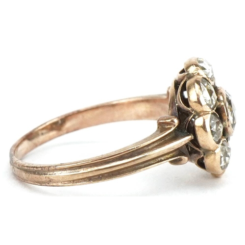 3025 - Antique unmarked gold diamond flower head ring, the central diamond approximately 4.20mm in diameter... 