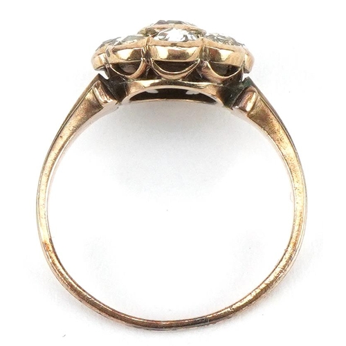 3025 - Antique unmarked gold diamond flower head ring, the central diamond approximately 4.20mm in diameter... 