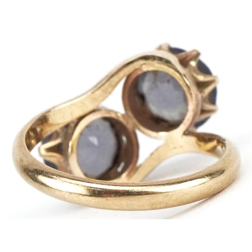 3055 - Unmarked gold alexandrite two stone crossover ring, tests as 9ct gold, the stones approximately 8.50... 