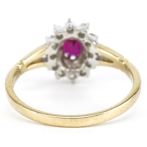 3109 - 9ct gold ruby and clear stone cluster ring, size L, 1.8g