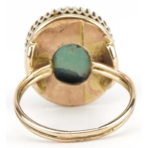 3086 - Unmarked gold green hardstone ring, tests as 9ct gold, size R, 8.6g