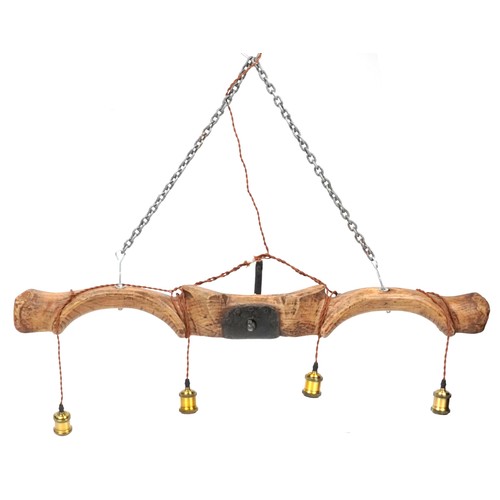 2438 - Industrial equestrian interest horse yolk four branch light fitting, 119cm wide