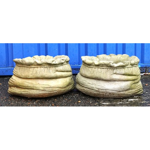 2216 - Pair of garden stoneware planters in the form of sacks, each 24cm high x 40cm wide