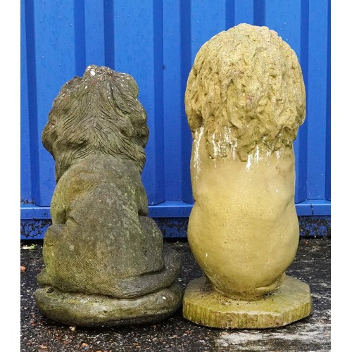 2215 - Two garden stoneware seated lions, the largest 50cm high