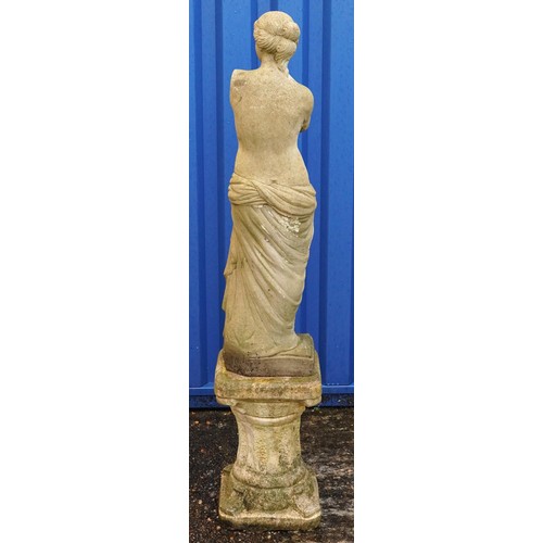 2213 - Large garden stoneware figure of Venus de Milo raised on a tapering column stand, 127cm high